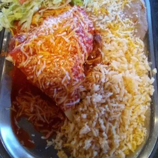 Smothered stuffed sopapilla plate at Las Trancas restaurant. Rice and beans the usual. The carne adovada was delicious.