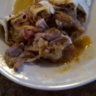 Las Trancas&apos; green Chile meat Burrito. Lots of large meat chunks. Very good.