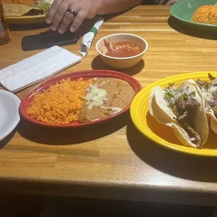 Street tacos, Spanish rice with refried beans and various sauces