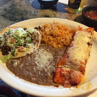 Taco &amp; Enchilada plate! My husband asked for his enchilada to be flour...they were happy to make it!!! Tasty!