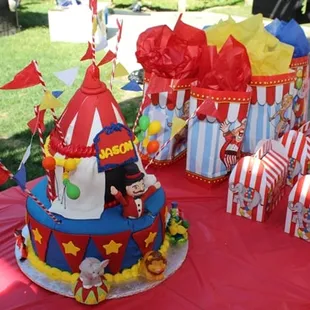 The ring leader lost it's legs in transporting to the party, improvised and made it look like he was popping out of the cake