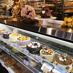 a display of cakes and pastries