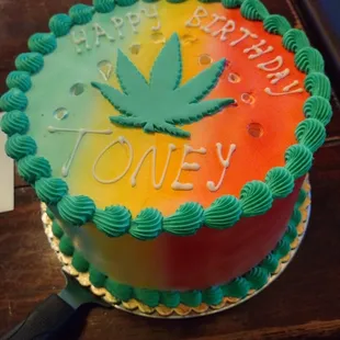 My custom cake. The birthday boy was born on 4/20 so that&apos;s why there is a pot leaf on the cake. It is Strawberry Shortcake.