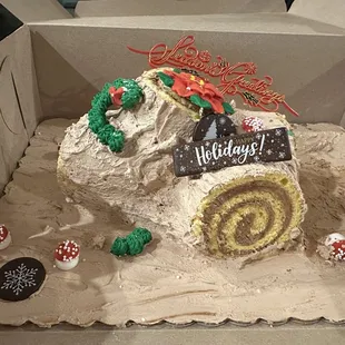 Half eaten Yule Log Cake.