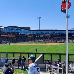 Overlooking Rightfield is a Grassy Hillside for Relax Layout Seating, Open to Anybody.