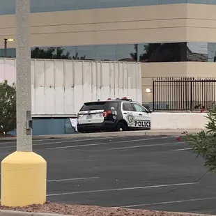 a police car parked in a parking lot