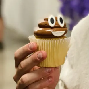 Poop emoji cupcake