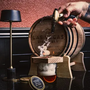 Our barrel aged rum, smoked with American white oak. The cocktail smoker and wood chips are available in our gift shop as well!