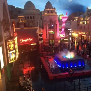 a fountain in the middle of a plaza