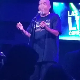 a man speaking into a microphone