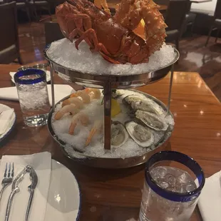 Large Seafood Tower $129. 1/2 lobster, King Crab, 6 shrimp, 6 oysters.