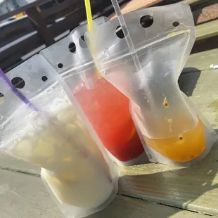 Piña colada, strawberry lemonade, passion fruit juice