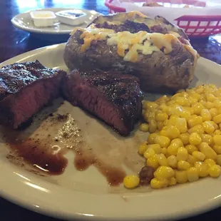 8 oz flat iron sirloin with a side baked potato and corn.