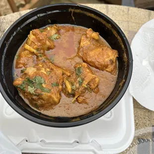Chicken korma with whole pieces of ginger