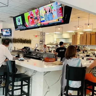 people sitting at the bar