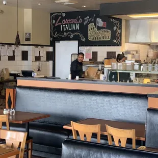 a woman behind the counter