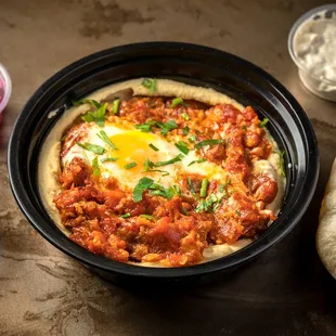 a bowl of food on a table