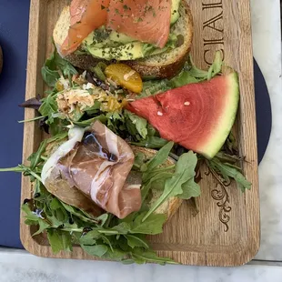 Toast Board with Salmon Avocado and Di Parma