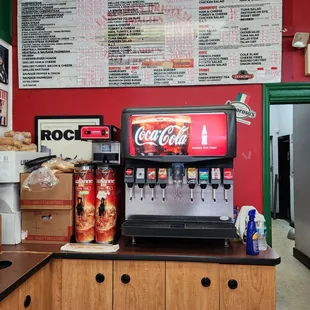 a coca cola machine in a restaurant