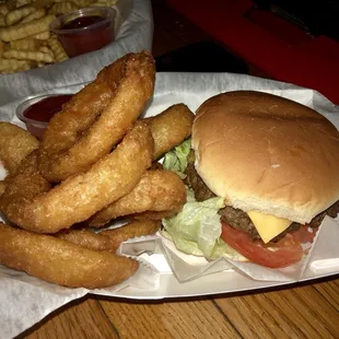 a hamburger and onion rings