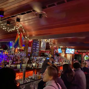 a crowd of people at the bar