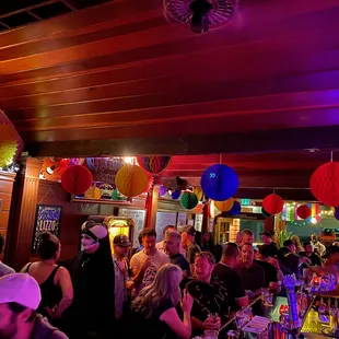 a large group of people at the bar