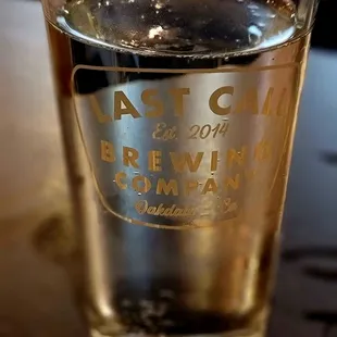 a glass of beer on a table