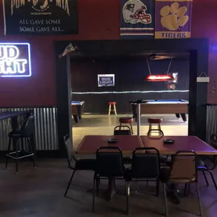 Two open walkways to access the pool table room