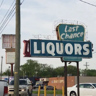 the last chance liquors sign