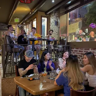 a group of people sitting at a table