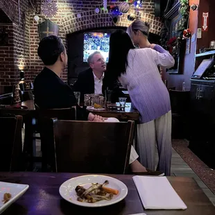 Owners w customers.
