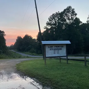 Signage with operating hours
