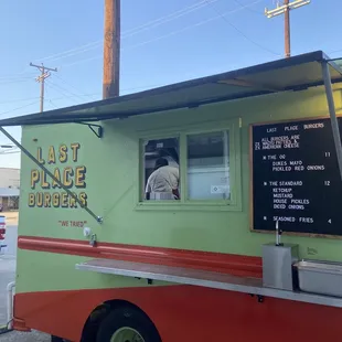 a green and red food truck