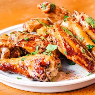 a plate of chicken wings