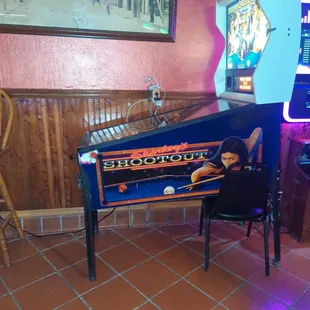 a pinball machine in a bar