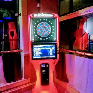 a dart board in the middle of the room
