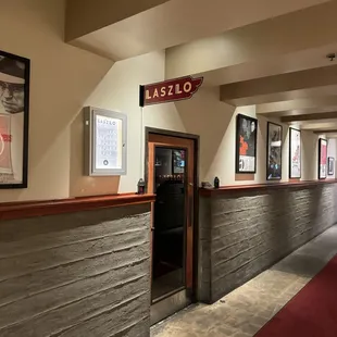 the entrance to a restaurant with a red carpet