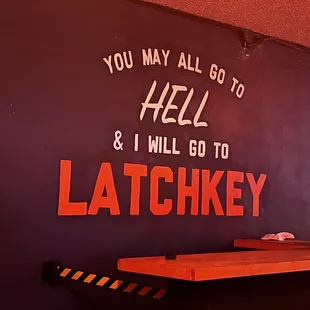 a sign on the wall of a restaurant
