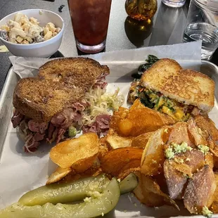 Reuben and pimento cheese sandwiches with chips and Mac salad