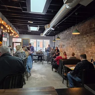 a group of people sitting at tables