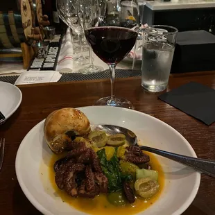 Spanish Octopus with olives and chili butter.