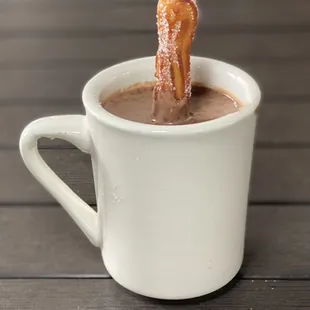 Very thick and &apos;warm&apos; hot chocolate with churros must try