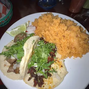 Two tacos, asada and chorizo both delicious