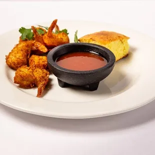 Coconut shrimp  corn bread and special sauce