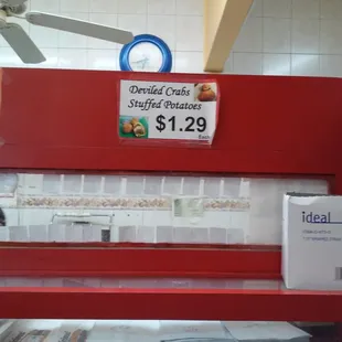 a woman behind a counter