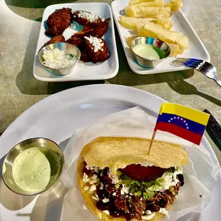 Pabellón arepa, yuca fries, and plantains.