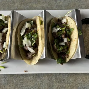 Steak tacos with a side of cheese