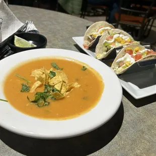 Chicken tortilla soup and an order of tacos