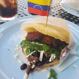 shredded beef arepa with fried plantains