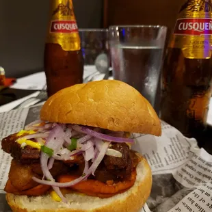 Pork sandwich paired with Peruvian beer